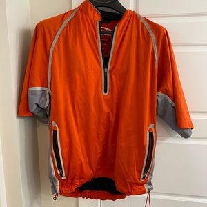 Sun mountain half sleeve rain flex half zip golf jacket.